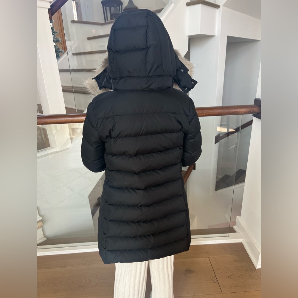 MONCLER Black winter jacket with furry hoodie.